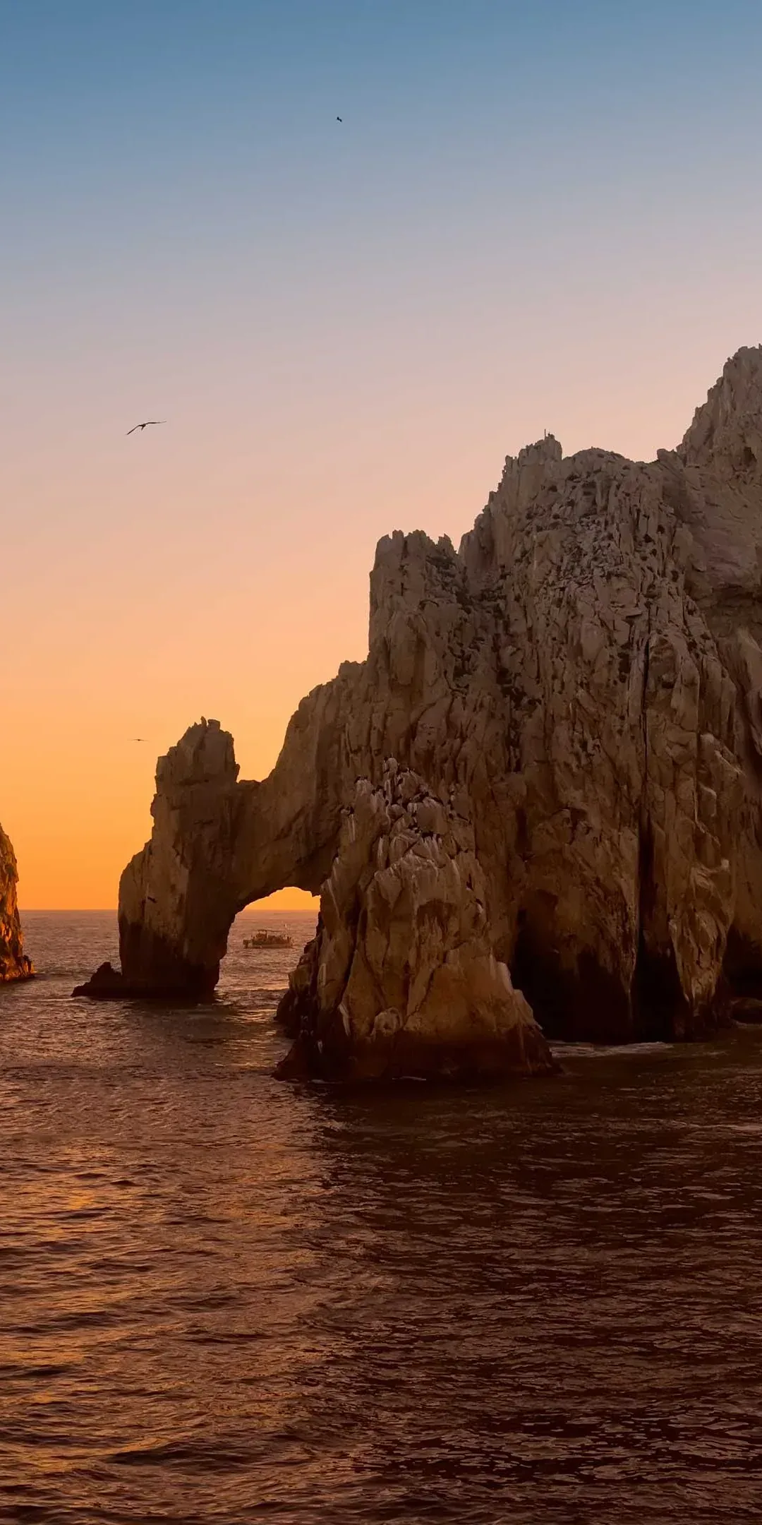 Aerial view of the Arch of Cabo San Lucas at the tip of the Baja Peninsula