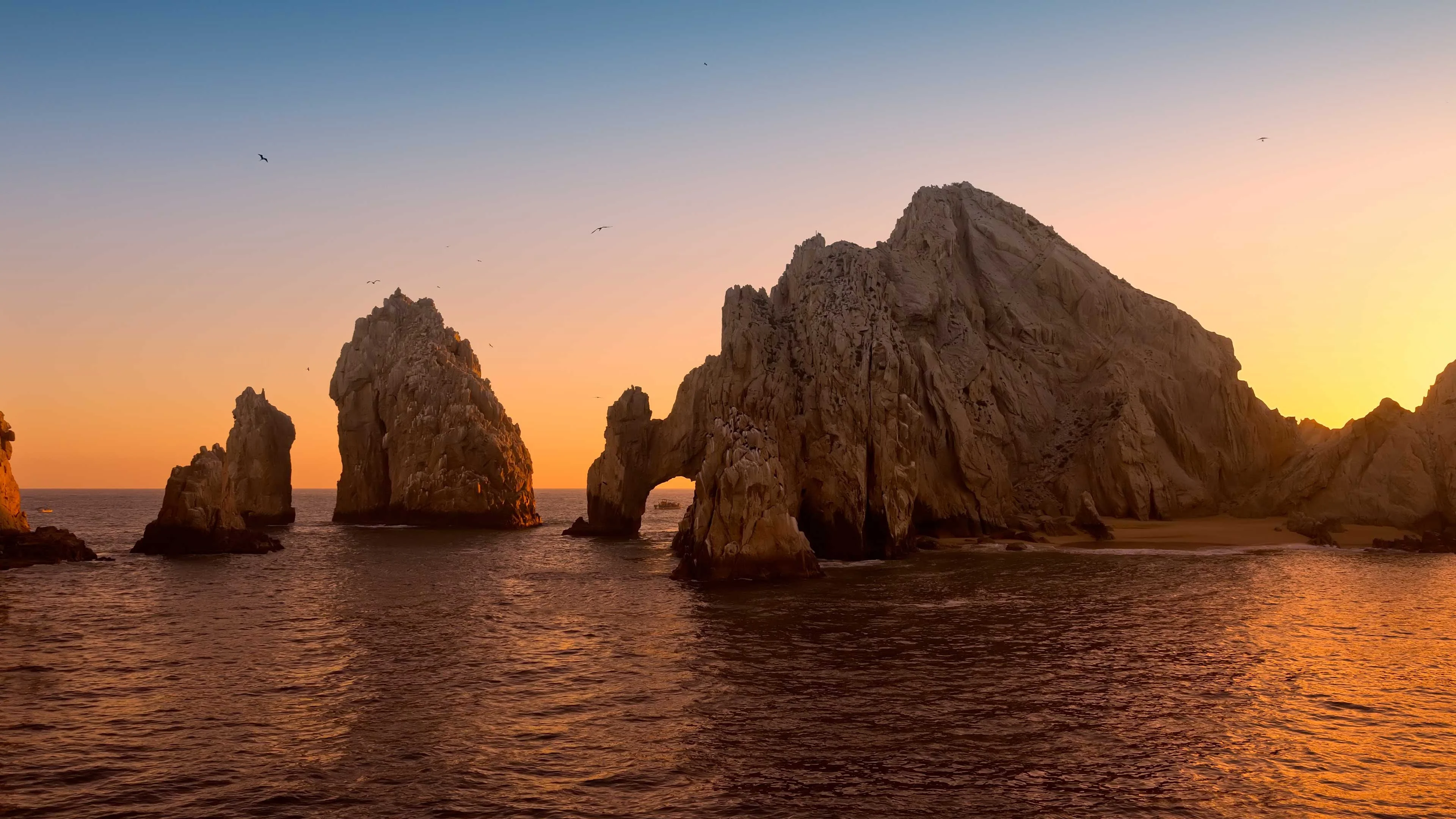 Aerial view of the Arch of Cabo San Lucas at the tip of the Baja Peninsula